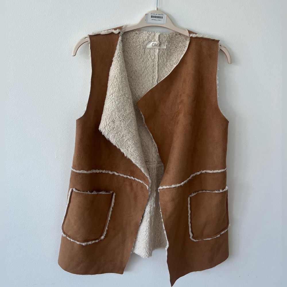 Brown and tan women’s dress. Soft and cozy.